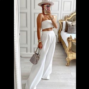White Bonded Scuba Pleated Extreme Wide
Leg Pants